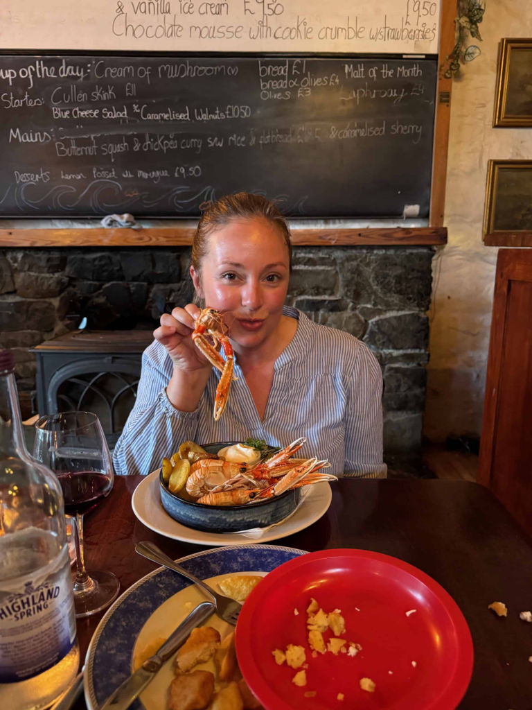 A picture of me eating Langoustines at the Old School Restaurant in Dunvegan