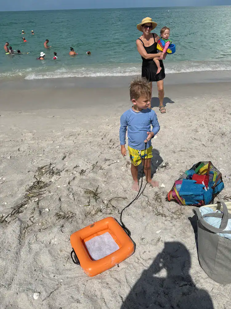 My son with his floating shark tooth sifter, while hunting for teeth!