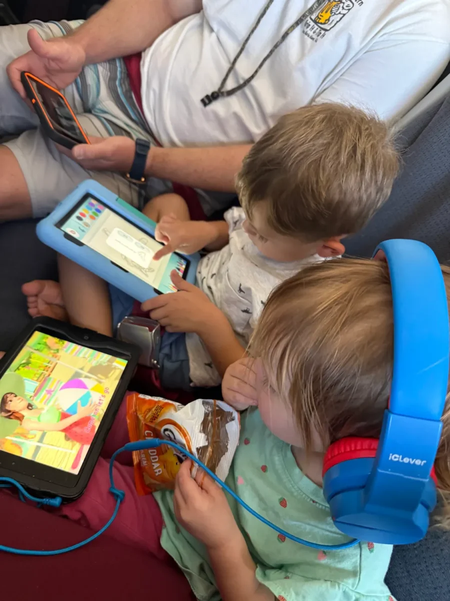 My kids playing on their tablets during a recent airplane ride.