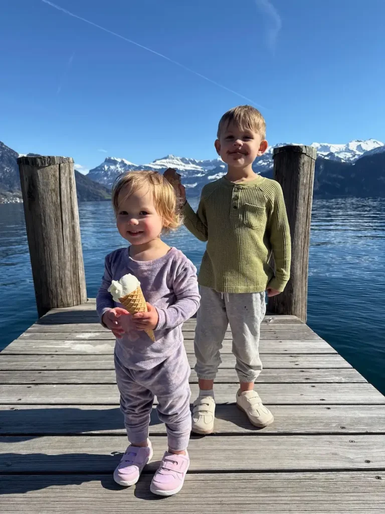 My kids eating Ice Cream in Weggis with the mountains in the background.