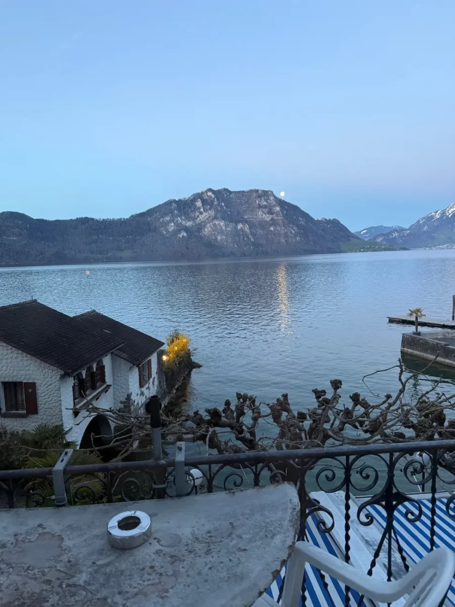 The view of the lake with a mountain behind it from our room in Weggis.